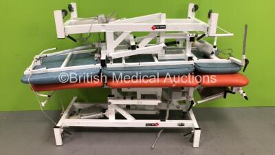 2 x Medi-Plinth Electric Patient Examination Couches with Controllers (Both Power Up)