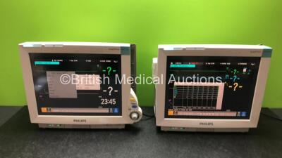 2 x Philips IntelliVue MP70 Patient Monitors (Both Power Up) with 2 x IntelliVue X2 Handheld Patient Monitors Including, ECG,SpO2,NBP,Press and Temp Options with 2 x Batteries (Both Power Up)