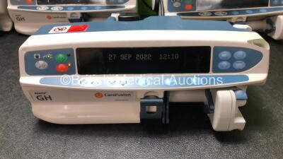 Job Lot of Pumps Including 7 x x Carefusion Alaris GH Syringe Pumps (All Power Up) 2 x Cardinal Health Alaris GH Pumps (Both Power Up) 1 x Carefusion Alaris PK Driver Pump (No Power with Damage Light-See Photo) - 5