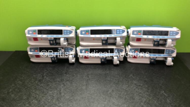 6 x CareFusion Alaris CC Plus Syringe Pumps (All Power Up with 1 x Blank Screen and All Require Service / Repair - See Photos) *800315706 / 800322758 / 800315779 / 800315778 / 800356308 / 800302752*