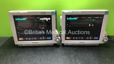 2 x Philips IntelliVue MP70 Patient Monitors with 2 x Philips IntelliVue X2 Handheld Patient Monitors with ECG, SpO2, NBP, Press and Temp Options (All Power Up with Damage-See Photos)