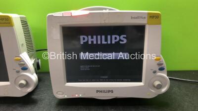 2 x Philips IntelliVue MP30 Patient Monitors with 2 x Philips IntelliVue X2 Handheld Patient Monitors with ECG, SpO2, NBP, Press and Temp Options (All Power Up with Damage-See Photos) - 3