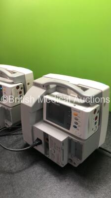 2 x Philips IntelliVue MP30 Patient Monitors (1 x Damage Charging Port See Photo) and 2 x IntelliVue X2 Handheld Patient Monitors with ECG, SpO2, NBP, Press and Temp Options (All Power Up, Damage to Screen See Photo) - 8