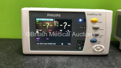 3 x IntelliVue X2 Handheld Patient Monitors Including ECG, SpO2, NBP, Press and Temp Options with 3 x Batteries (2 Power Up when Tested with Stock Batteries-Batteries Included are Flat and All Damaged-See Photos) 1 x Philips REF 867036 Module Including EC - 3