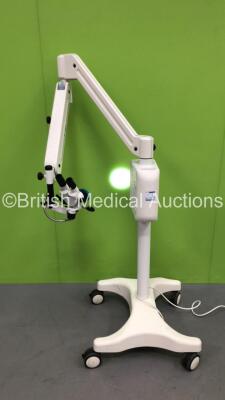 Global Surgical Microscope with 2 x M1010A Eyepieces, M 1028-200 Lens and NovaLux Global Light Source on Stand (Powers Up with Good Bulb)