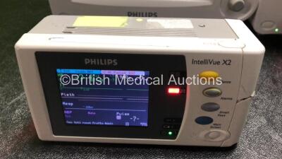 2 x Philips IntelliVue MP30 Patient Monitors (Both Power Up, 1 x Damage to Casing - See Photos) with 2 x Philips IntelliVue X2 Handheld Patient Monitors Including Press, Temp, NBP, SpO2 and ECG/Resp Options with 2 x Batteries (Both Power Up with Damage to - 4