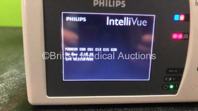 2 x Philips IntelliVue MP30 Patient Monitors (Both Power Up, 1 x Damage to Casing - See Photos) with 2 x Philips IntelliVue X2 Handheld Patient Monitors Including Press, Temp, NBP, SpO2 and ECG/Resp Options with 2 x Batteries (Both Power Up with Damage to - 5