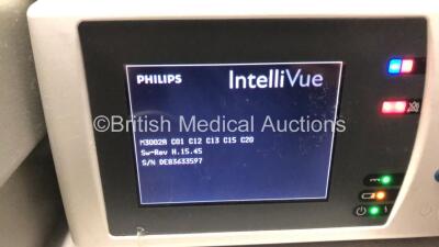 2 x Philips IntelliVue MP30 Patient Monitors (Both Power Up, 1 x Damage to Casing - See Photos) with 2 x Philips IntelliVue X2 Handheld Patient Monitors Including Press, Temp, NBP, SpO2 and ECG/Resp Options with 2 x Batteries (Both Power Up with Damage to - 12