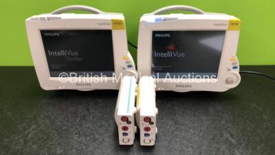 2 x Philips IntelliVue MP30 Patient Monitors (Both Power Up, 1 x with Printer Option, 1 x Crack in Casing - See Photos) with 2 x Philips M3001A Modules Including Press, Temp, NBP, SpO2 and ECG/Resp Options (1 x Damaged Casing - See Photos)