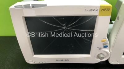 2 x Philips IntelliVue MP30 Patient Monitors (1 x No Power with Printer Option and Cracked Screen, 1 x Powers Up with Missing Dial - See Photos) with 2 x Philips M3001A Modules Including Press, Temp, NBP, SpO2 and ECG/Resp Options (1 x Damaged Casing - Se - 2