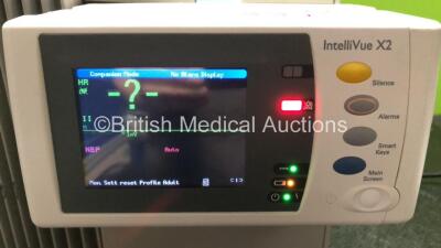 Job Lot Including 1 x Philips IntelliVue MP70 Touch Screen Patient Monitor (Powers Up with Damage to Casing - See Photos) 1 x Philips IntelliVue X2 Patient Monitor with Press, Temp, NBP, SPO2 and ECG Resp Options (Powers Up) and 1 x Philips M3015A Opt: C0 - 8