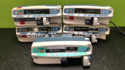 Job Lot Including 2 x CareFusion Alaris GH Syringe Pumps (Both Power Up) 1 x CareFusion Alaris GH Plus Syringe Pump (Powers Up) 1 x Cardinal Health Alaris GH Syringe Pump (Powers Up, Requires Service) and 1 x CareFusion Alaris PK Syringe Pump (Powers Up) 