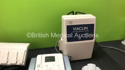 Mixed Lot Including 1 x Drager Infinity Hemomed Module, Defibrillator Batteries *Untested* BP Meters, 1 x Freeway Elite Nebulizer, 1 x Zeiss Microscope Eye Attachment and 1 x Canon DS810 Unit - 4