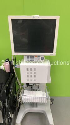 Mixed Lot Including 1 x GE CDA19T Monitor on Stand with Tram-RAC Module Rack, 1 x Seca Stand on Scales, 2x Blood Pressure Meter on Stand, Oak Medical Tourniquet and Manual Wheelchair - 4