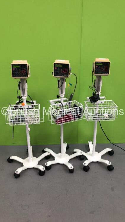 3 x CSI Criticare 506DXN Vital Signs Monitors on Stands with Selection of Leads (All Power Up)