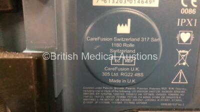 Mixed Lot Including 2 x Waldmann PUVA 180 UV Lights (Both Power Up, Do Not Illuminate) 1 x PUVA 200 UV Light (Untested Due to Foreign Plug) 1 x CareFusion Alaris PK Syringe Pump (Powers Up with IM3 Code) and 1 x Covidien Genius 3 Tympanic Thermometer with - 6