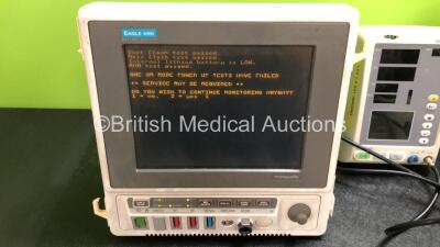 Job Lot Including 1 x Marquette Eagle 4000 Patient Monitor (Powers Up) 1 x Edan M3A Vital Signs Monitor (Powers Up with Missing Light Cover - See Photos) 1 x Fukuda Denshi DS-7300 Monitor (Does Not Power Up) and 1 x Philips M8048A Module Rack Including 3 - 3