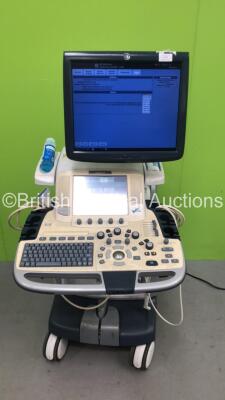 GE Logiq E9 Flat Screen Ultrasound Scanner Model 5205000-4 Software Version R2.0.4 with 1 x GE 9L-D REF 5194432 Transducer / Probe *Mfd 01-2010* and 1 x GE L8-18i REF 5336965 Transducer / Probe *Mfd 11-2013*  and 1 x Sony UP-D897 Printer (Powers Up) *SN 9