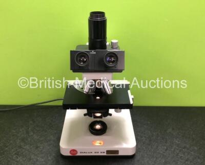 Leitz Dialux 20 EB Type 020-452-008 Benchtop Microscope with 2 x Leitz 10x/18 Eyepieces Including 1 x Leitz NPl 6.3/0.20 Optic, 1 x Leitz NPl 40/0.65 Optic, 1 x Leitz NPl 25/0.50 Optic and 1 x Leitz NPl 16/0.40 Optic (Powers Up with Good Bulb) *SN 0125A*