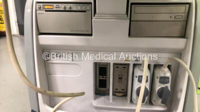 GE Logiq E9 Flat Screen Ultrasound Scanner Model 5205000-4 Software Version R2.0.4 with 1 x GE 9L-D REF 5194432 Transducer / Probe *Mfd 01-2010* and 1 x GE L8-18i REF 5336965 Transducer / Probe *Mfd 11-2013*  and 1 x Sony UP-D897 Printer (Powers Up) *SN 9 - 8