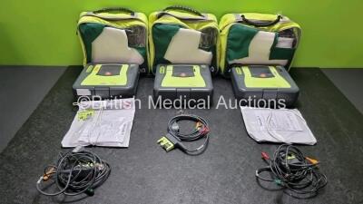 3 x Zoll AED PRO Defibrillators with 3 x Batteries, 3 x 3 Lead ECG Leads, 2 x Electrode Packs Both Out of Date* (All Power Up) in Carry Cases *SN AA10H018451 / AA10B016516 / AA09C013169*