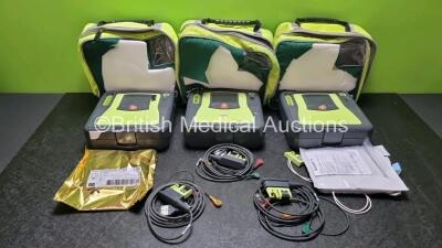 3 x Zoll AED PRO Defibrillators with 2 x Batteries, 3 x 3 Lead ECG Leads, 3 x Electrode Packs *1 x in Date 2 x Out of Date* (All Power Up) in Carry Cases *SN AA10C016898 / AA07E006023 / AA10C016699*