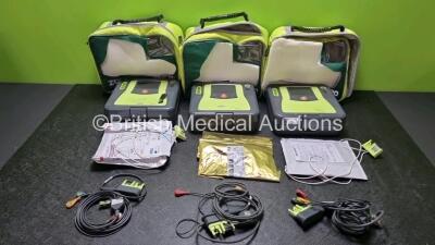 3 x Zoll AED PRO Defibrillators with 3 x Batteries, 3 x 3 Lead ECG Leads, 5 x Electrode Packs *2 x in Date 3 x Out of Date* (All Power Up) in Carry Cases *SN AA061003725 / AA10C016897 / AA11C019986*