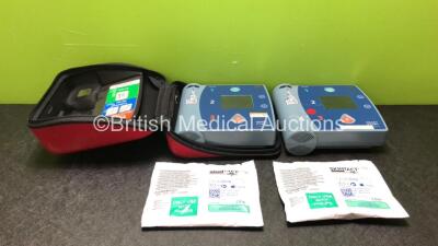 2 x Philips Heartstart FR2+ Defibrillators with 2 x Batteries *Install Dates 07-2025, 12-2025* and 2 x Skintact Electrodes in 1 x Carry Case (Both Power Up) *SN 0208270706 / 0910990270*