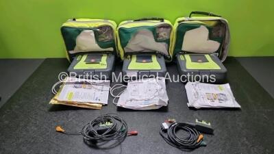 3 x Zoll AED PRO Defibrillators with 3 x Batteries, 2 x 3 Lead ECG Leads, 6 x Electrode Packs *2 x in Date 4 x Out of Date* (All Power Up) in Carry Cases *SN AA10C016877 / AA11A019523 / AA10C016747*