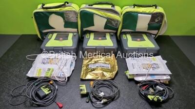 3 x Zoll AED PRO Defibrillators with 2 x Batteries, 3 x 3 Lead ECG Leads, 7 x Electrode Packs *5 x in Date 2 x Out of Date* (All Power Up) in Carry Cases *SN AA13C027911 / AA10C016815 / AA10B016556*