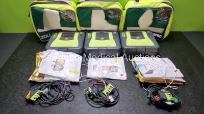 3 x Zoll AED PRO Defibrillators with 3 x Batteries, 3 x 3 Lead ECG Leads, 8 x Electrode Packs *5 x in Date 3 Out of Date* (All Power Up) in Carry Cases *SN AA11B019921 / AA10C016694 / AA11AA019524*