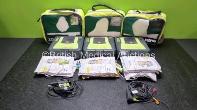 3 x Zoll AED PRO Defibrillators with 3 x Batteries, 2 x 3 Lead ECG Leads, 7 x Electrode Packs *5 x in Date 2 x Out of Date* (All Power Up) in Carry Cases *SN AA11C020024 / AA13B027599 / AA10C016849*