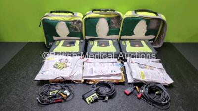 3 x Zoll AED PRO Defibrillators with 3 x Batteries, 3 x 3 Lead ECG Leads, 10 x Electrode Packs *6 x in Date 4 x Out of Date* (All Power Up, 1 x Scratches on Screen See-Photo) in Carry Cases *SN AA08G011261 / AA10C016635 / AA10H018573*