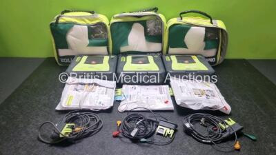 3 x Zoll AED PRO Defibrillators with 3 x Batteries, 3 x 3 Lead ECG Leads, 5 x Electrode Packs *All Out of Date* (All Power Up) in Carry Cases *SNAA10C016853 / AA10A016238 / AAA10C016660*