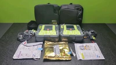 2 x Zoll AED PRO Defibrillators with 2 x Batteries, 2 x 3 Lead ECG Leads, 3 x Electrode Packs *All Out of Date* (All Power Up) in Carry Cases *SN AA13C027890 / AA10C016634*