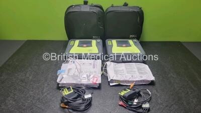 2 x Zoll AED PRO Defibrillators with 2 x Batteries, 2 x 3 Lead ECG Leads, 2 x Electrode Packs *All Out of Date* (All Power Up) in Carry Cases *SN AA13C027861 / AA13C027909*