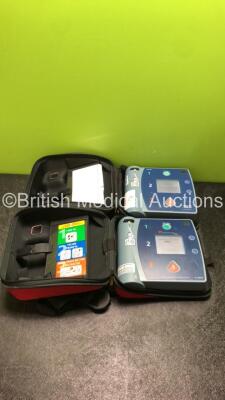 1 x Philips Heartstart FR2+ Defibrillator,1 x Agilent FR2 Heartstart Defibrillator and 2 x Batteries in Carry Cases (Both Power Up)