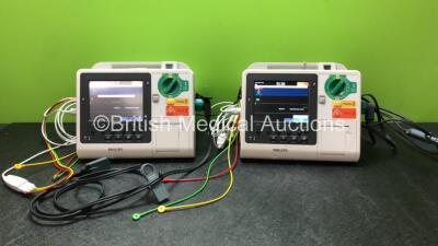 2 x Philips Heartstart XL+ Defibrillators Including Pacer, ECG and Printer Options *Mfd 2013 / 2013* with 2 x Paddle Leads and 2 x Philips ECG Leads (Both Power Up)