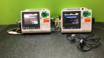 2 x Philips Heartstart XL+ Defibrillators Including Pacer, ECG and Printer Options *Mfd 2013 / 2013* with 2 x Paddle Leads and 2 x Philips ECG Leads (Both Power Up)