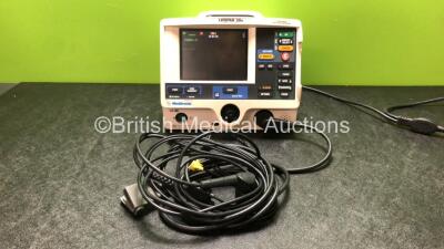 Medtronic Lifepak 20e Defibrillator / Monitor Including Pacer, ECG and Printer Options *mfd 2009* with 1 x Paddle Lead and 1 x 3 Lead ECG Lead (Powers Up with Missing Door)