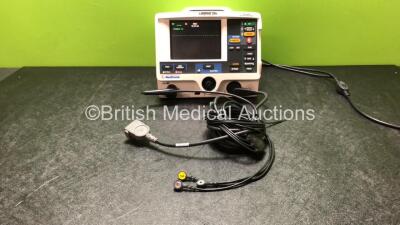 Medtronic Lifepak 20e Defibrillator / Monitor Including Pacer, ECG and Printer Options *Mfd 2012* with 1 x Paddle Lead and 1 x 3 Lead ECG Lead (Powers Up with Missing Door and Service Light-See Photos)