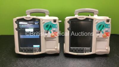 2 x Philips HeartStart MRx Defibrillator / Monitors with Pacer, ECG and Printer Options and 1 x M3539A Module (Both Power Up)