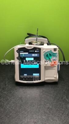 Philips HeartStart MRx Defibrillator / Monitor with ECG and Printer Options, 1 x ECG Lead, 1 x Paddle Lead with Test Load, 1 x M3538A Battery and 1 x M3539A Module (Both Power Up)