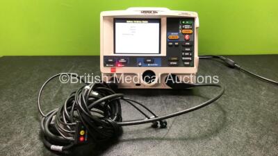 Physio Control Lifepak 20e Defibrillator / Monitor Including Pacer ECG and Printer Options *Mfd 2015* with 1 x Paddle Lead and 1 x ECG Lead (Powers Up with Missing Door and Service Light-See Photos)