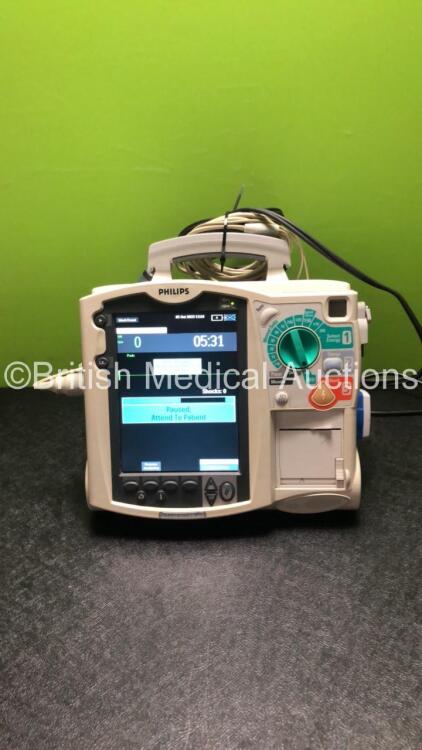 Philips HeartStart MRx Defibrillator / Monitor with Pacer, ECG and Printer Options, 1 x ECG Lead, 1 x Paddle Lead with Test Load, 1 x M3538A Battery and 1 x M3539A Module (Both Power Up)