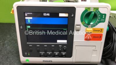 2 x Philips Heartstart XL+ Defibrillators Including Pacer, ECG and Printer Options with 2 x Paddle Leads and 2 x 3 Lead ECG Leads (Both Power Up) *SN US71514666 / US71514665* - 2