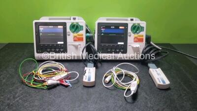 2 x Philips Heartstart XL+ Defibrillators Including Pacer, ECG and Printer Options with 2 x Paddle Leads, 2 x M3725a Test Loads and 2 x 3 Lead ECG Leads (Both Power Up) *SN US31716634 / USN307801*