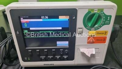 2 x Philips Heartstart XL+ Defibrillators Including ECG and Printer Options with 2 x Paddle Leads, 2 x M3725a Test Loads and 2 x 3 Lead ECG Leads (Both Power Up) *US71514445 / US71514444* - 3