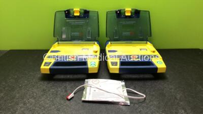 2 x Cardiac Science Powerheart AED G3 Defibrillators with 1 x Electrode and 2 x Powerheart AED G3 Batteries (Both Power Up)