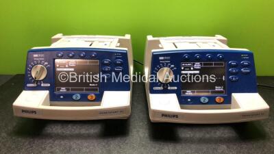 2 x Philips Heartstart XL Smart Biphasic Defibrillators with ECG and Printer Options (Both Power Up) *SN US0000458258 / US005887047*